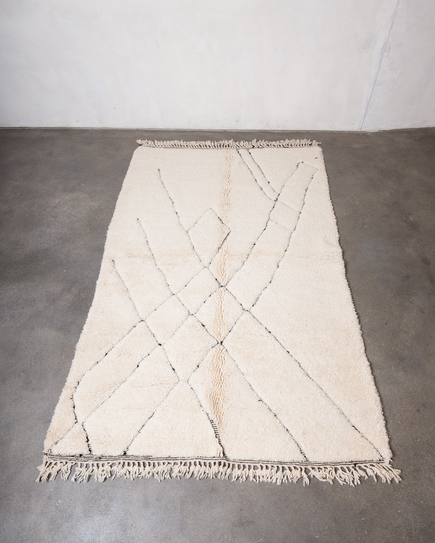 Modern, designer, handcrafted Berber rug from Morocco. Beniourain carpet with beautiful colours and patterns and fluffy wool texture.